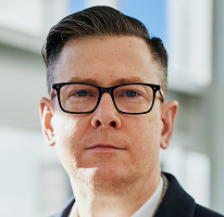 Alexander Hughes, bir kripto ticaret şirketinin CEO'su olarak görev yapan yönetici, portre